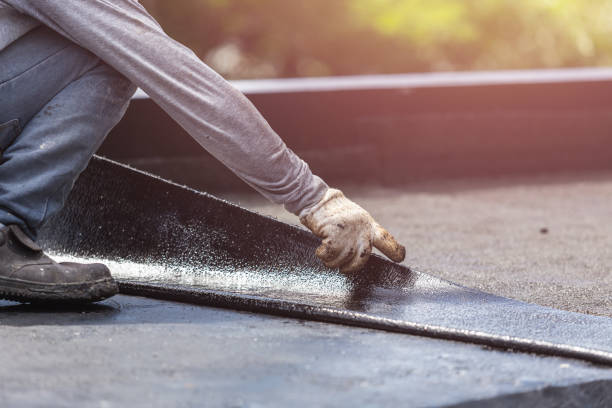 Professional Waterproofing technician working in Laurel, IN